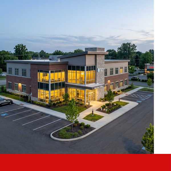 An aerial view of a clinic and parking lot